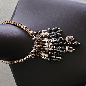 Chicos choker style necklace with multiple strands of beads